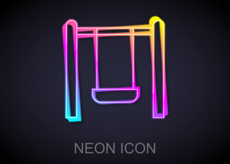 Glowing neon line Swing for kids summer games on playground icon isolated on black background. Outdoor entertainment equipment. Vector