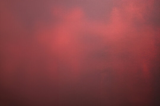 Abstract red background with a hazy effect.