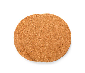 Round cork table coasters on white background