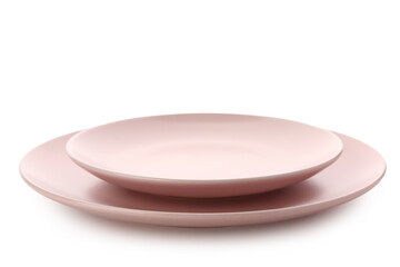 Pink ceramic plates on white background