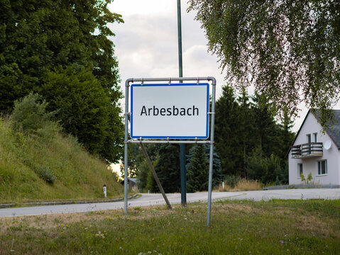 Arbesbach location sign at the entry of the Austrian municipality. The district is located in Lower Austria. The sign is next to the street into the rural place.