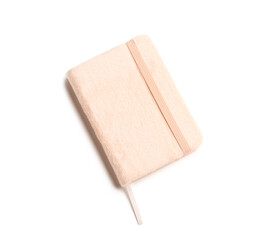 Stylish notebook in pink plush cover isolated on white background