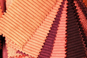 Close-up of colorful upholstery fabric samples. Textile texture background