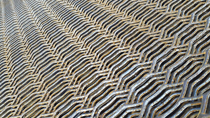 Metal grid. Iron grid. Perforated metal background