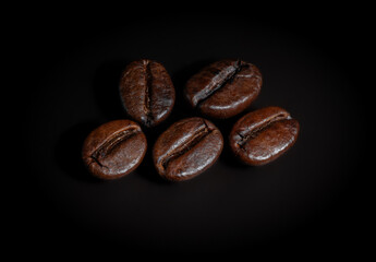 coffee beans isolated on black background
