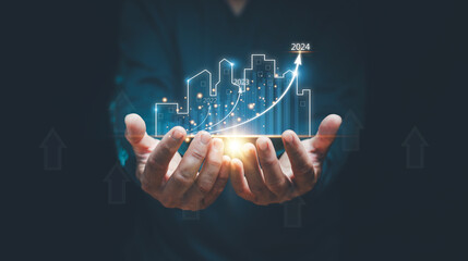Concept of business prosperity and asset management, Real estate investment marketing analysis, Man holding graphic of analyzed graph of business growth, Planning to increase profits of business. - obrazy, fototapety, plakaty