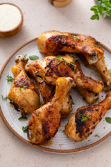 Roasted chicken drumsticks with garlic and herbs