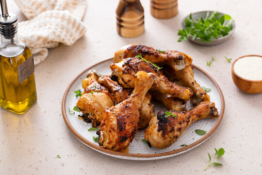 Roasted chicken drumsticks with garlic and herbs