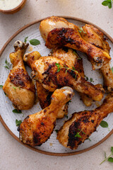 Roasted chicken drumsticks with garlic and herbs