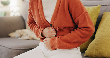 Stomach ache, cramps and hands of woman with abdomen pain due to constipation, menstruation or ibs...