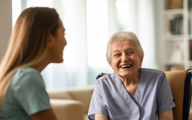 Obraz premium An elderly woman smiling at a nurse in nursing home