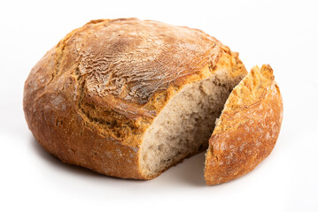 Round wRound wheat bread with cracked crust. Isolate on white backgroundheat bread with cracked crust