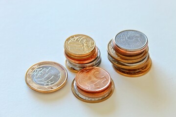 four stacks of coins