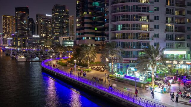 night illuminated famous dubai marina crowded walking bay bridge top panorama 4k timelapse uae 
