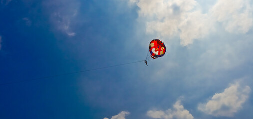 Parasailing in the blue sky, Anyer beach, Indonesia