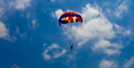 Parasailing in the blue sky, Anyer beach, Indonesia