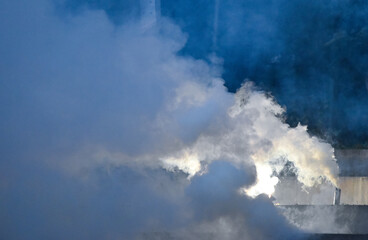 Fototapeta na wymiar Smoke flares and lights on the football game
