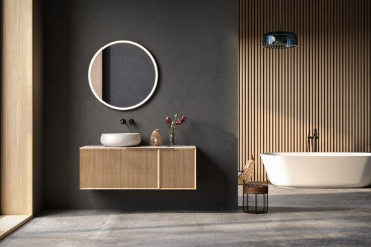 Comfortable bathtub and vanity with basin standing in modern bathroom black blue and wooden walls and concrete floor.Front view