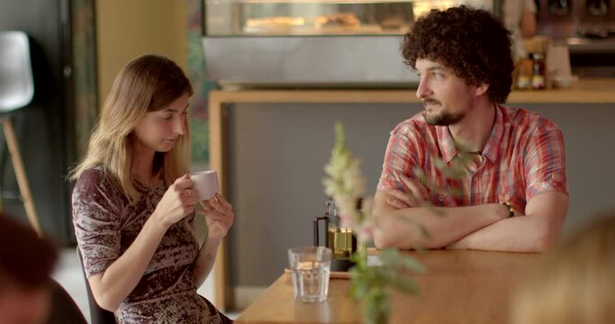Portrait couple solves relationship problems in public space, people lifestyle. Honest conversation is openly discussing their issues and concerns. Dialogue of two persons. valuing resolving conflicts