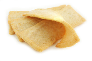Korean Thin Fish cake, square shaped on white background. Asian food fish cake, eomuk or odeng.