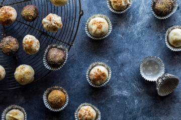 An arrangement of pumpkin spice truffles in mini paper cups.