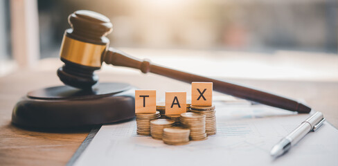 Tax law concept. Wooden blocks word 