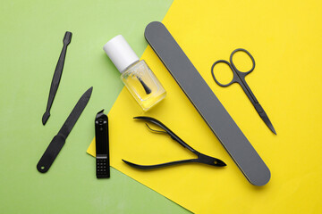 Set of pedicure tools on color background, flat lay