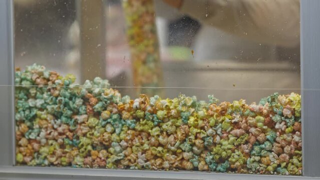 Selling popcorn at cinema - multicolored popcorn