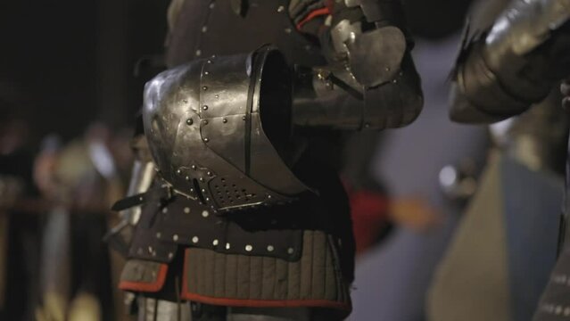 Medieval gladiator in armor, street show