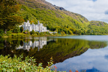 Kylemore Abbey, reflected in the lake, Ireland.