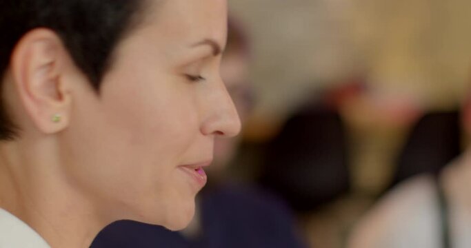 Woman closeup portrait engaged in conversation at cafe, expressing needs, opinions. Nonviolent communication techniques, fostering respectful empathetic dialogue. Lifestyle people close up young woman