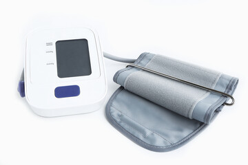 Automatic blood pressure monitor on white background. Digital blood pressure monitor on white...