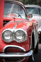 Close up view of classic car head lamp.
