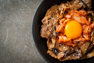 pork bulgogi rice bowl with kimchi and Korean pickled egg
