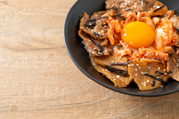 pork bulgogi rice bowl with kimchi and Korean pickled egg