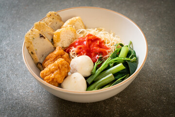 egg noodles with fish balls and shrimp balls in pink sauce, Yen Ta Four or Yen Ta Fo