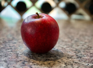 red apple on the table