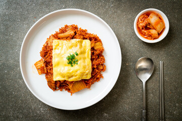 kimchi fried rice with pork and topped cheese