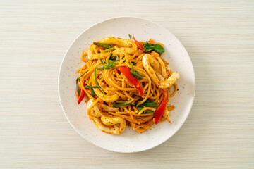 stir-fried spaghetti with salted egg and squid