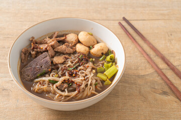 Thai noodle with pork, stewed pork, meatball and pork liver in blood soup