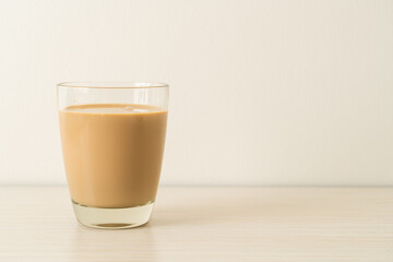 coffee latte glass with ready to drink coffee bottles