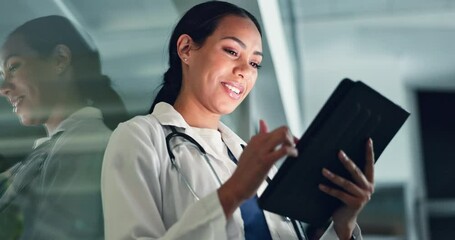 Doctor, woman and tablet at night with medical, healthcare and clinic data for research. Female professional, employee and telehealth with online consulting on a web app for wellness and planning