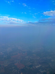 I see a keyboard-shaped cloud in the scenery.