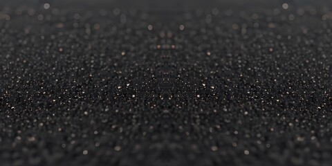 Black shimmering surface closeup of sand texture. Defocused distanse dark empty background. AI © avextra