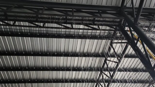 Heavy rain causes factory roof to leak