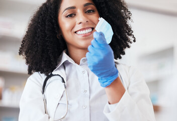 Healthcare, portrait and doctor remove mask or medical worker with freedom, safety or smile....