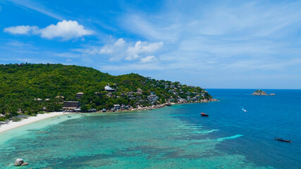 Fototapeta premium The tropical seashore island in a coral reef ,blue and turquoise sea Amazing nature landscape with blue lagoon