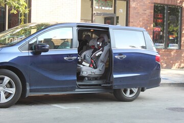 Open minivan with carseats installed