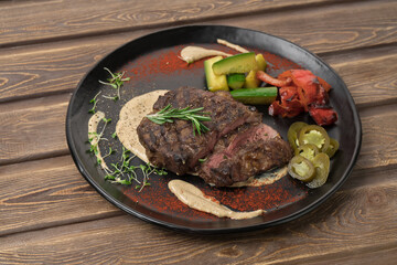 Grilled meat steak on a plate, restaurant menu