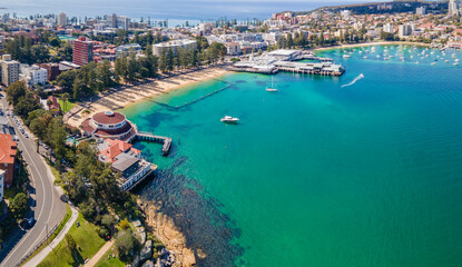 Aerial drone panoramic view of Manly Cove Beach and Manly Wharf on the Northern Beaches of Sydney,...